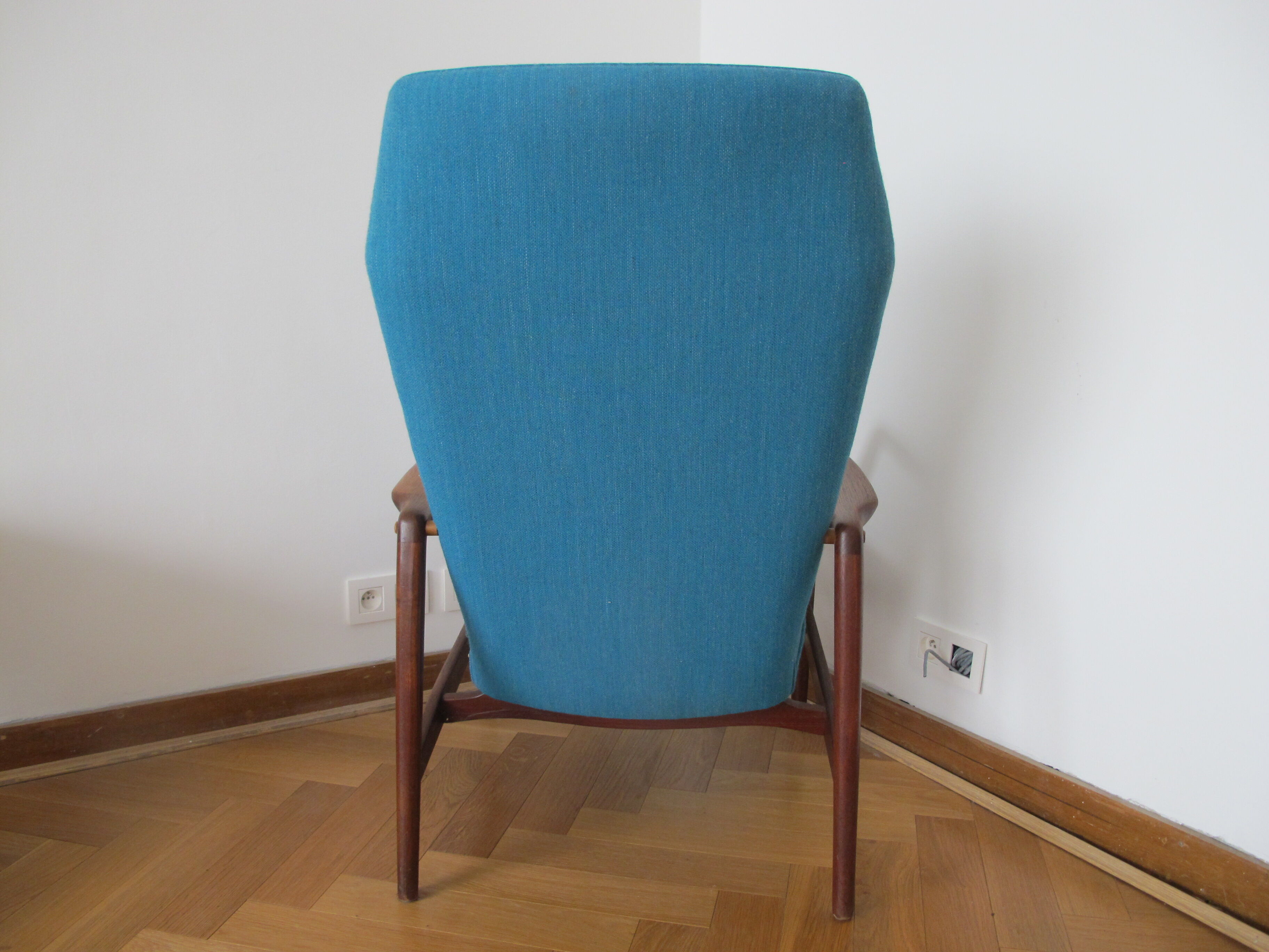 Tall back chair by Kurt Olsen