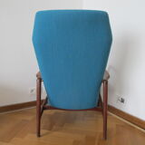 Tall back chair by Kurt Olsen
