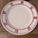 Eight Badonviller dinner plates