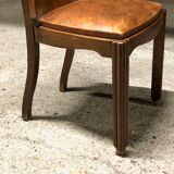 Set of 6 vintage solid wood chairs with animal motif on the back and leather seat