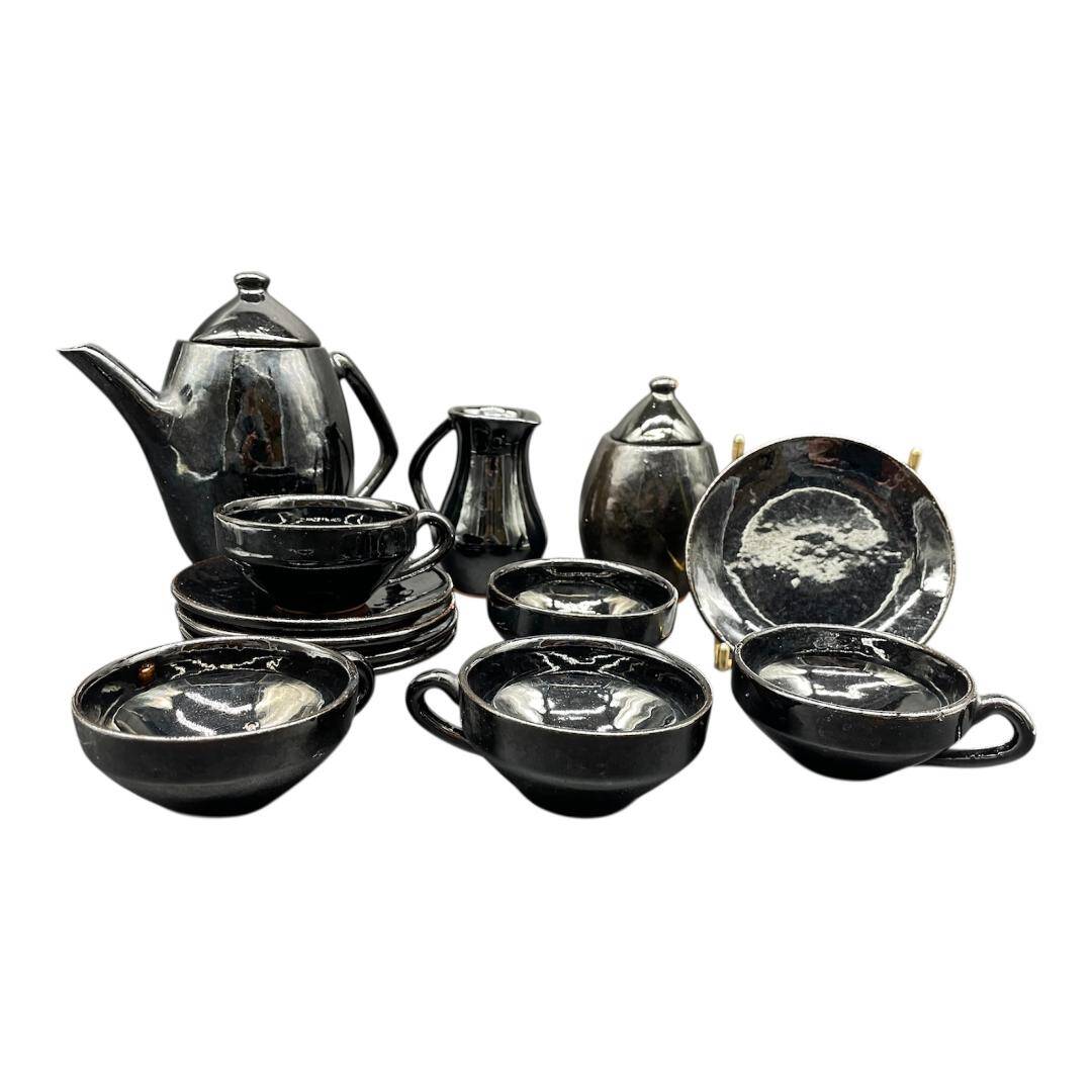 Brutalist black ceramic coffee service – Modernist design