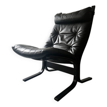 Scandinavian black leather armchair Siesta by Ingmar Relling, design 1970.