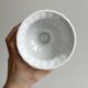 White ribbed porcelain plant pot cover