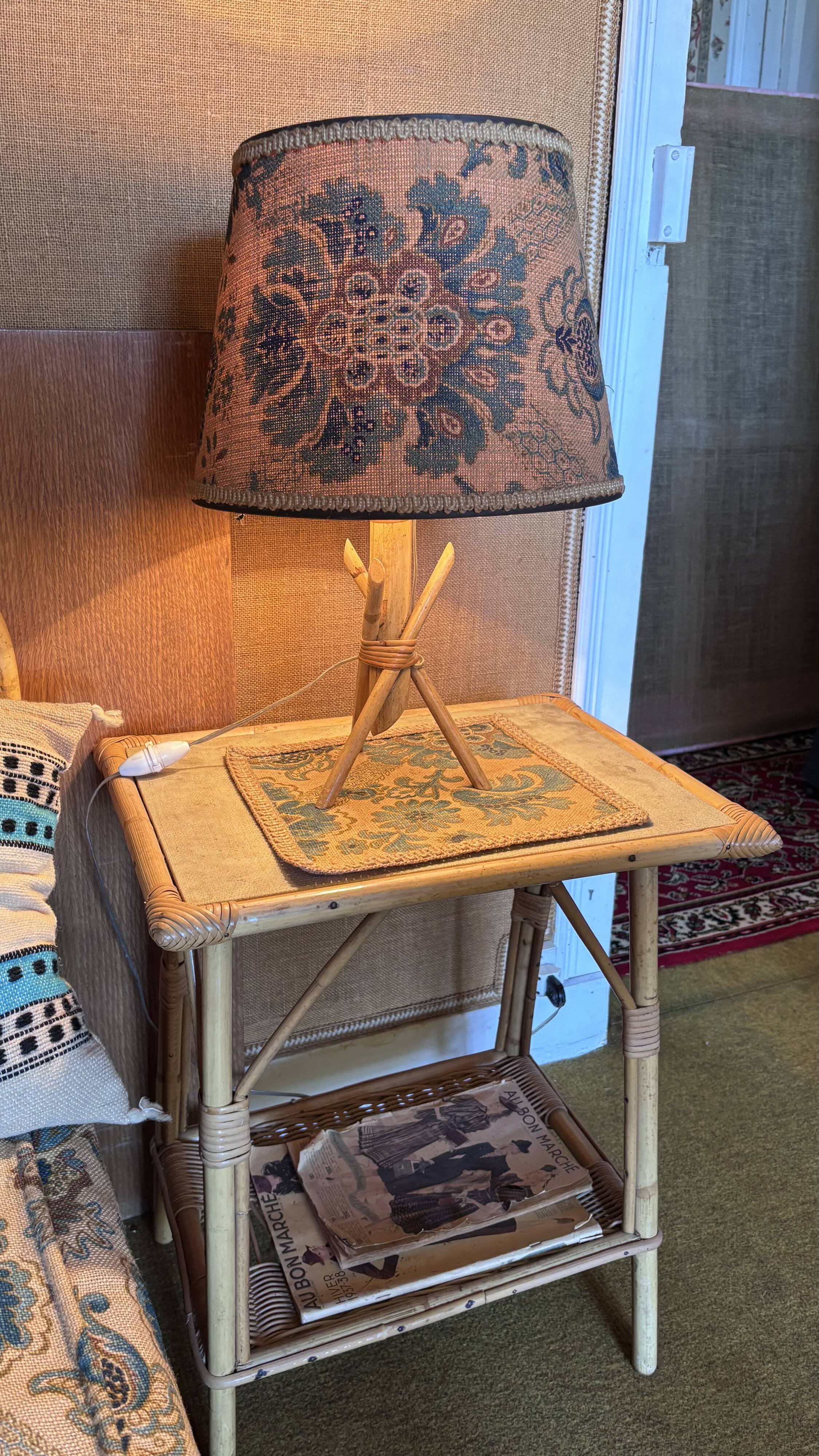 Rattan and bamboo lamp with printed fabric shade.