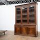 Large glass-fronted library in rosewood from the 19th century.