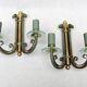 Pair of art deco lacquered metal, brass and glass wall lights
