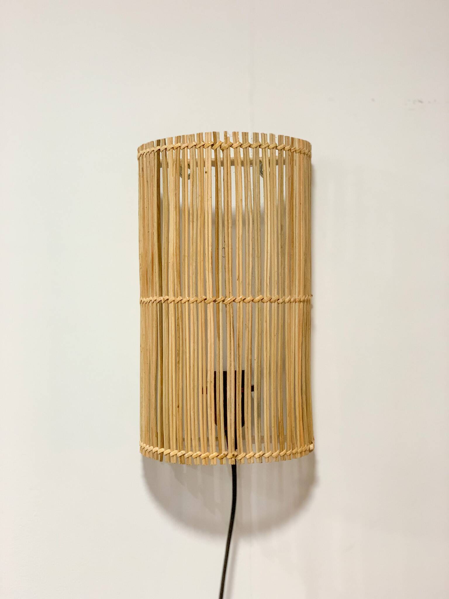 Natural rattan wall light