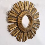 Miroir soleil en bois doré 1950