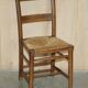 Set of six Dutch oak chairs with woven straw seats, circa 1860.