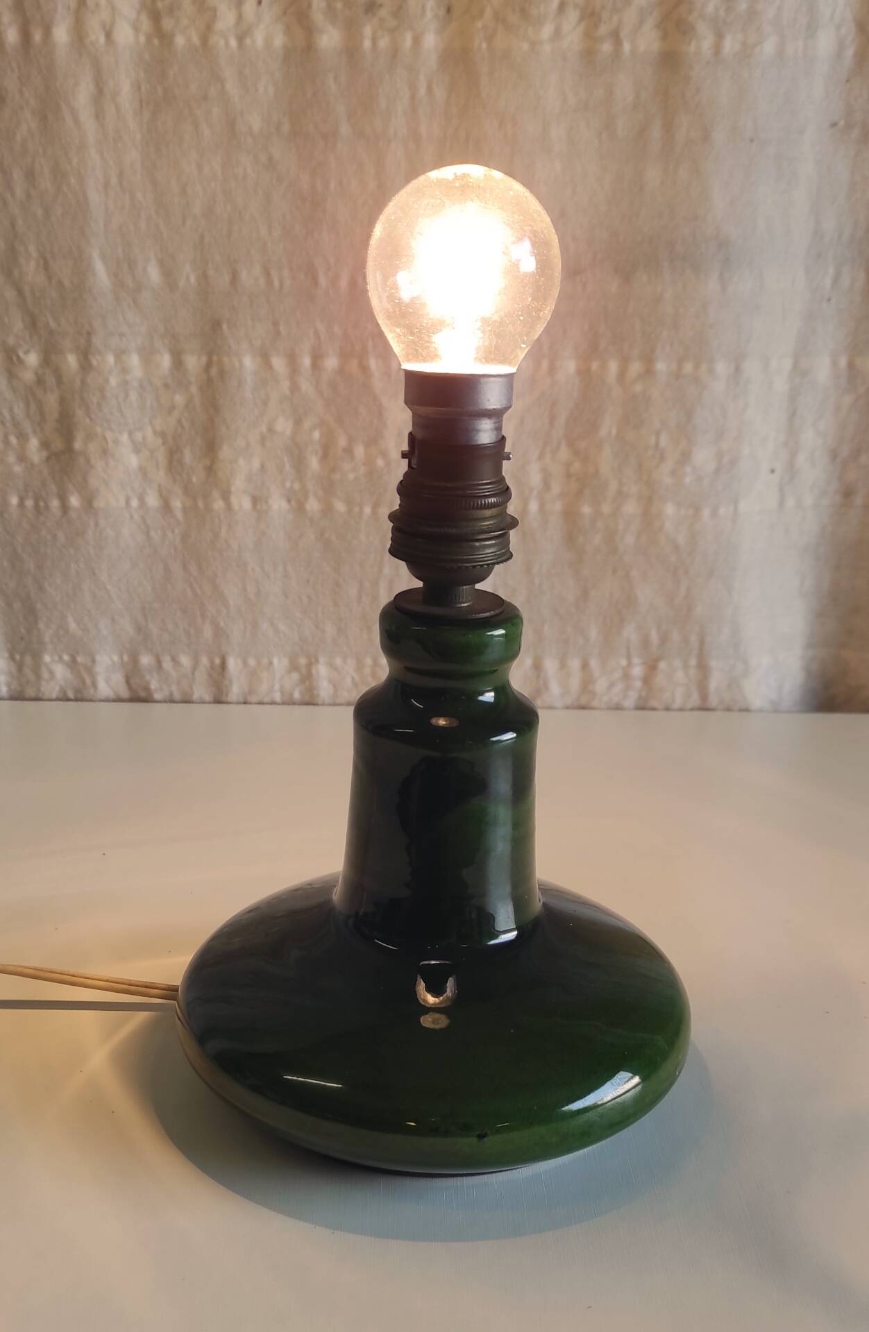 Green glazed ceramic table lamp base in Scandinavian style.