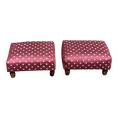 2 low footstools in burgundy fabric and solid wood