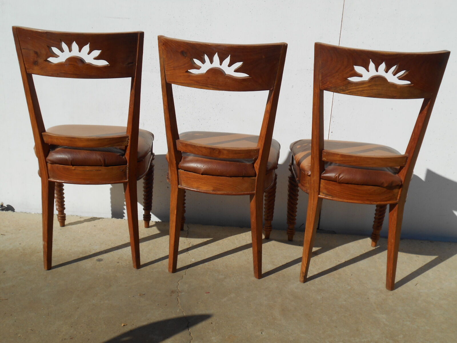 6 exotic wood and leather chairs,