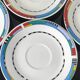 Set of small plates, vintage saucers in porcelain.