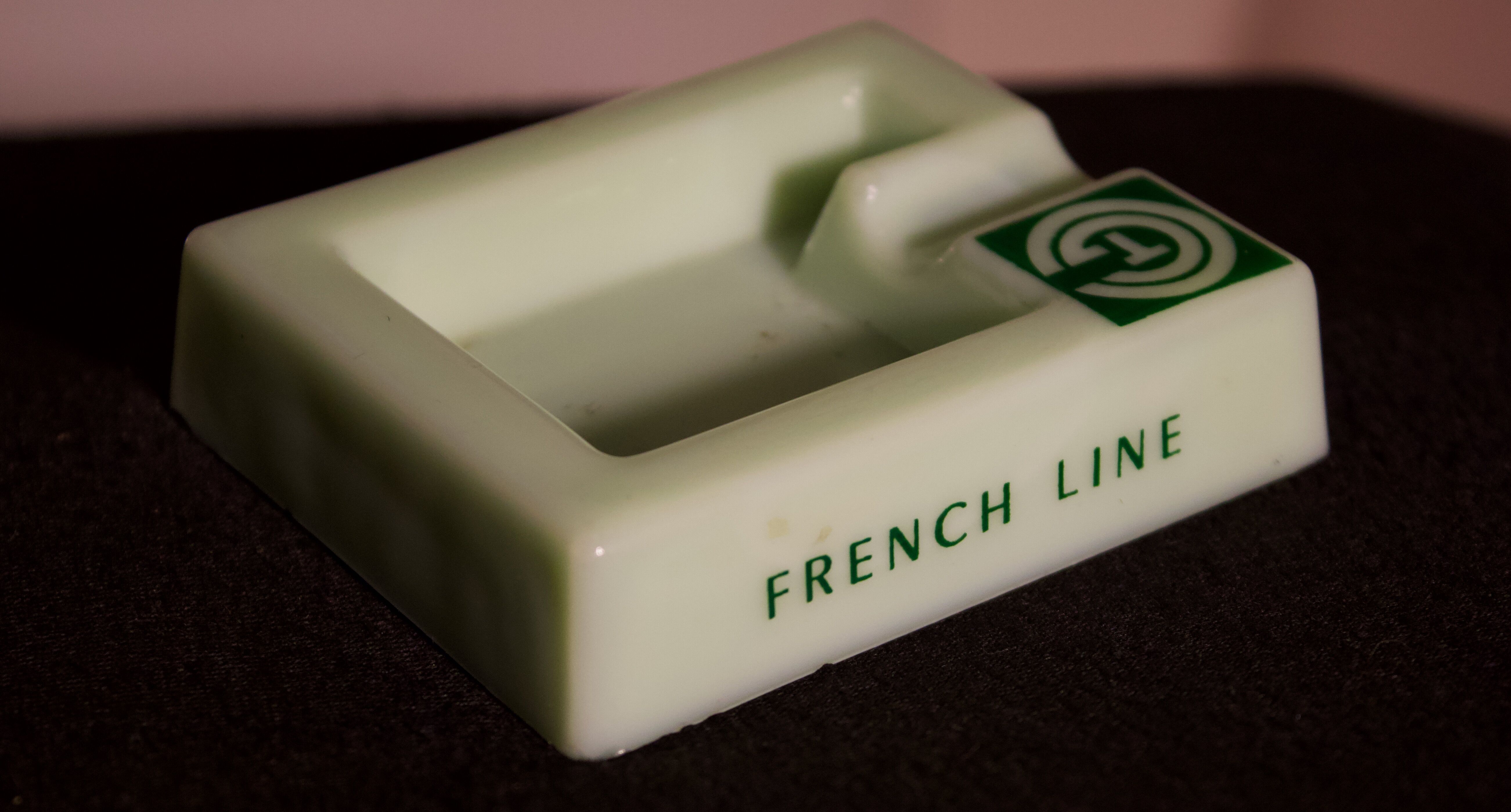 Three opalex ashtrays at the Logo of the Trans-Atlantic General Company - French Line - Model created by Jean Luce for the cruises of the liner Normandy and France