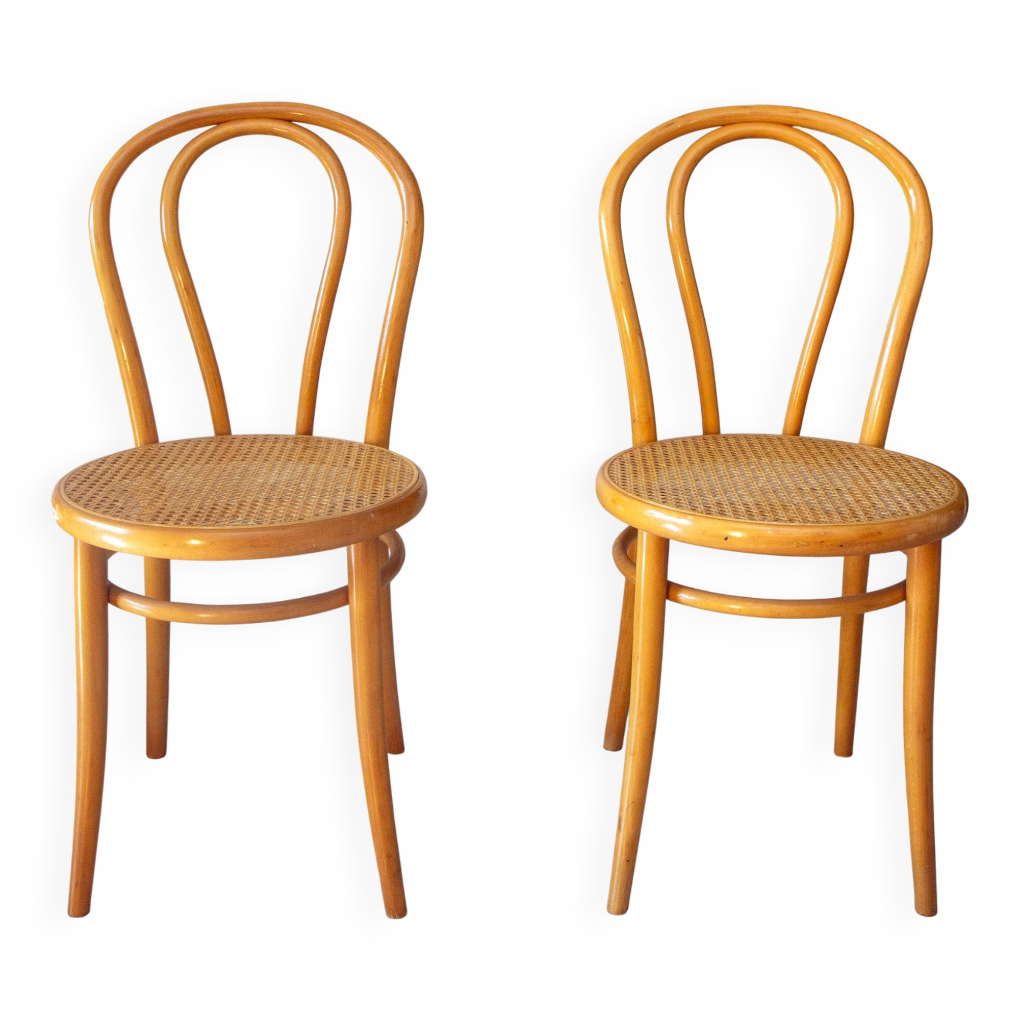 Pair of 1970s bistro chairs in bentwood and caning.