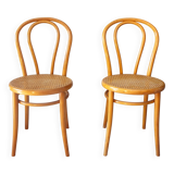 Pair of 1970s bistro chairs in bentwood and caning.