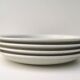 Set of 4 dessert plates and 1 “Thistle” bowl