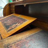 Beautiful vintage 20th-century American cylinder desk and its chair.