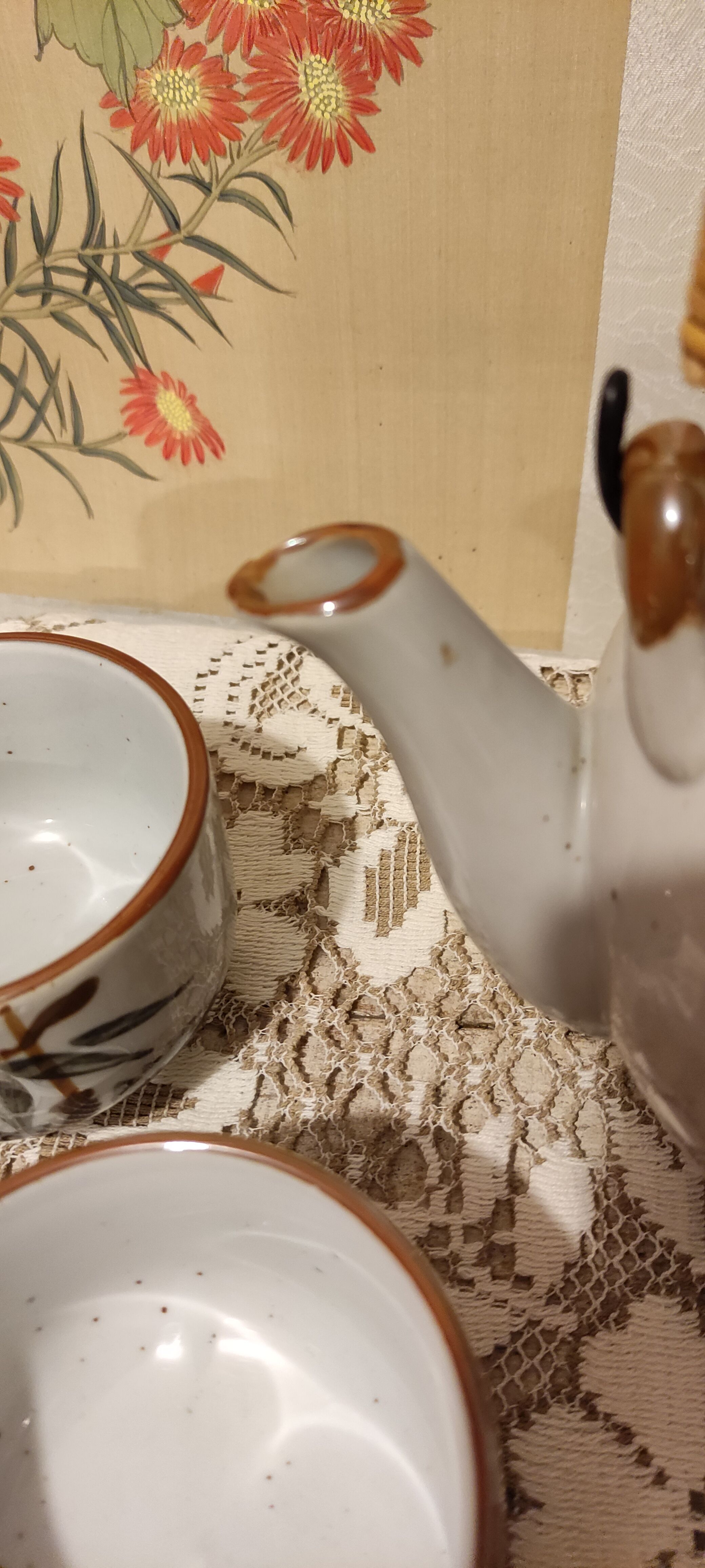 Asian set of a teapot and its cups