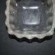 Lalique glass ashtray bowl with frosted finish, engraved with wave design, signed Lalique.