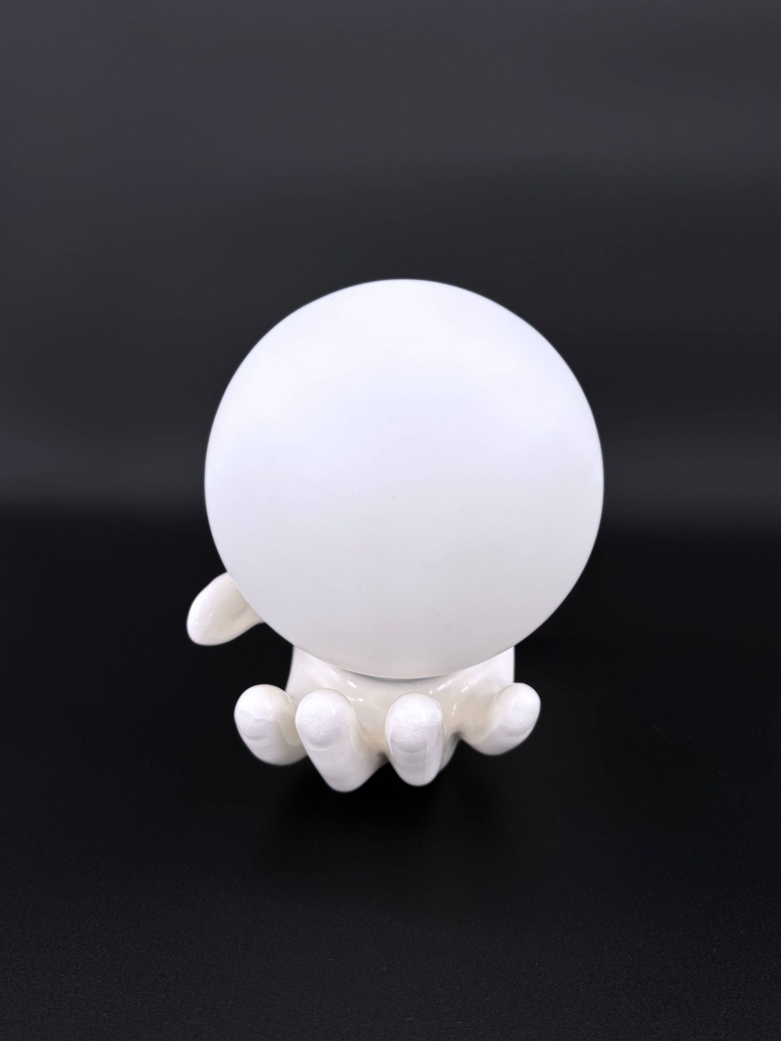 Vintage ceramic wall light - hand holding an opaline globe, 1970s