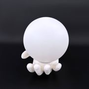 Vintage ceramic wall light - hand holding an opaline globe, 1970s