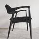 Pair of Mid Century Modern armchairs in astrakhan leather.