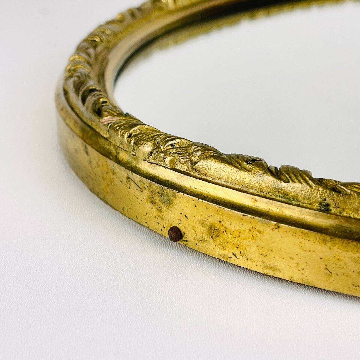 Vintage mirror in a brass frame, Italy, 1950s.