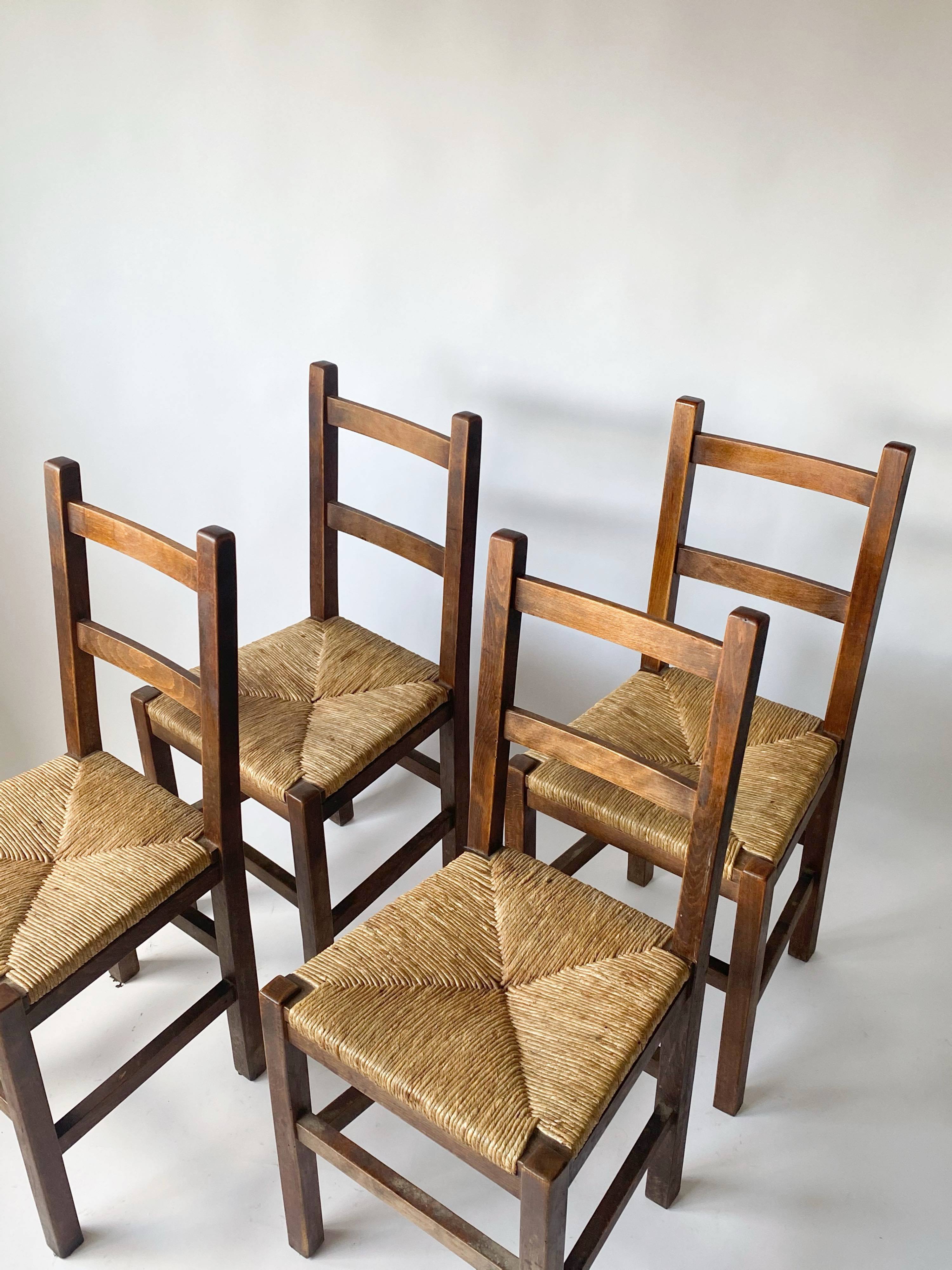 4 wooden and straw country chairs