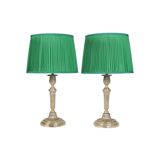 Candlesticks mounted as lamps, silver-plated bronze.