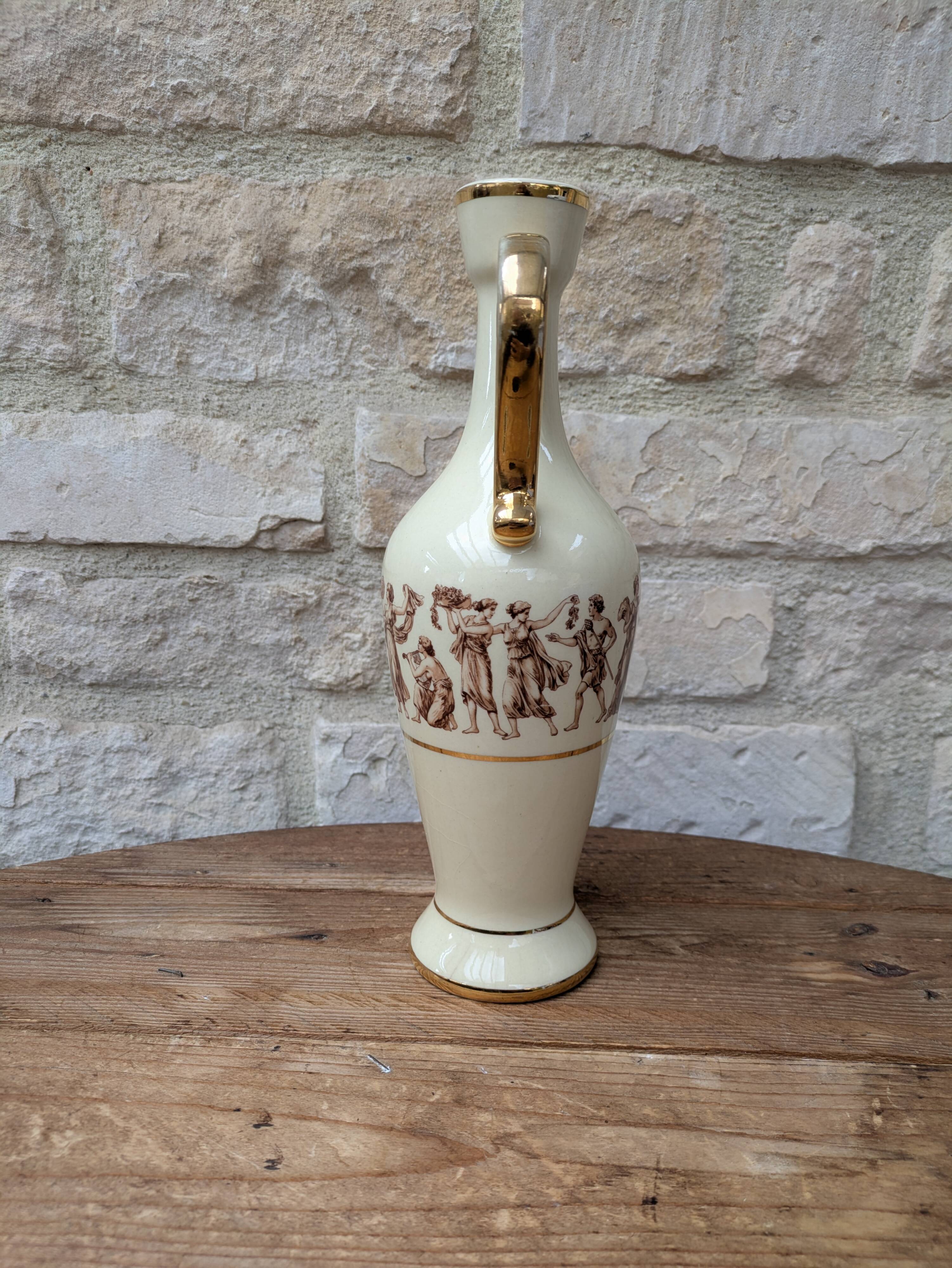 Antique amphora-shaped vase with Roman or Greek decoration