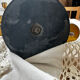 Pair of Empire style candlesticks, patinated brass and black stone.