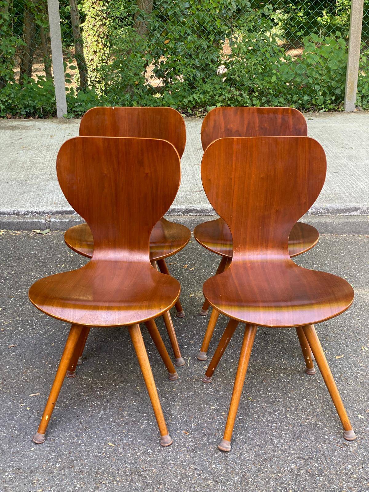 4 vintage Scandinavian dining chairs in curved walnut.