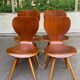 4 vintage Scandinavian dining chairs in curved walnut.