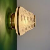 Vintage Art Deco globe wall/ceiling light in white, black, and gold glass.