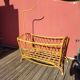Bamboo and rattan baby cot with canopy.