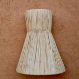 Handmade conical raffia wall light