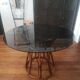 Rattan dining table and smoked glass