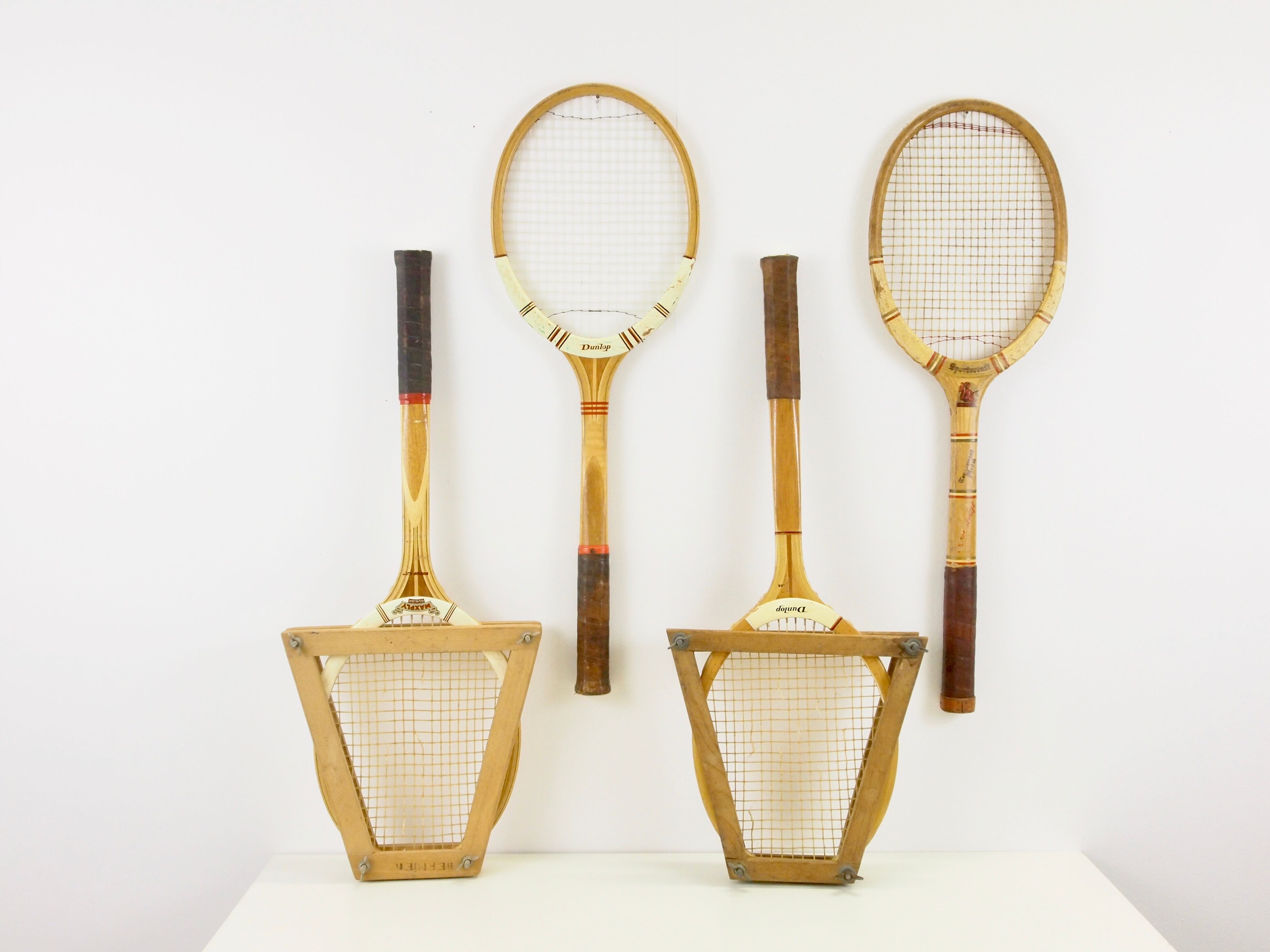 Set of 4 vintage wooden tennis rackets