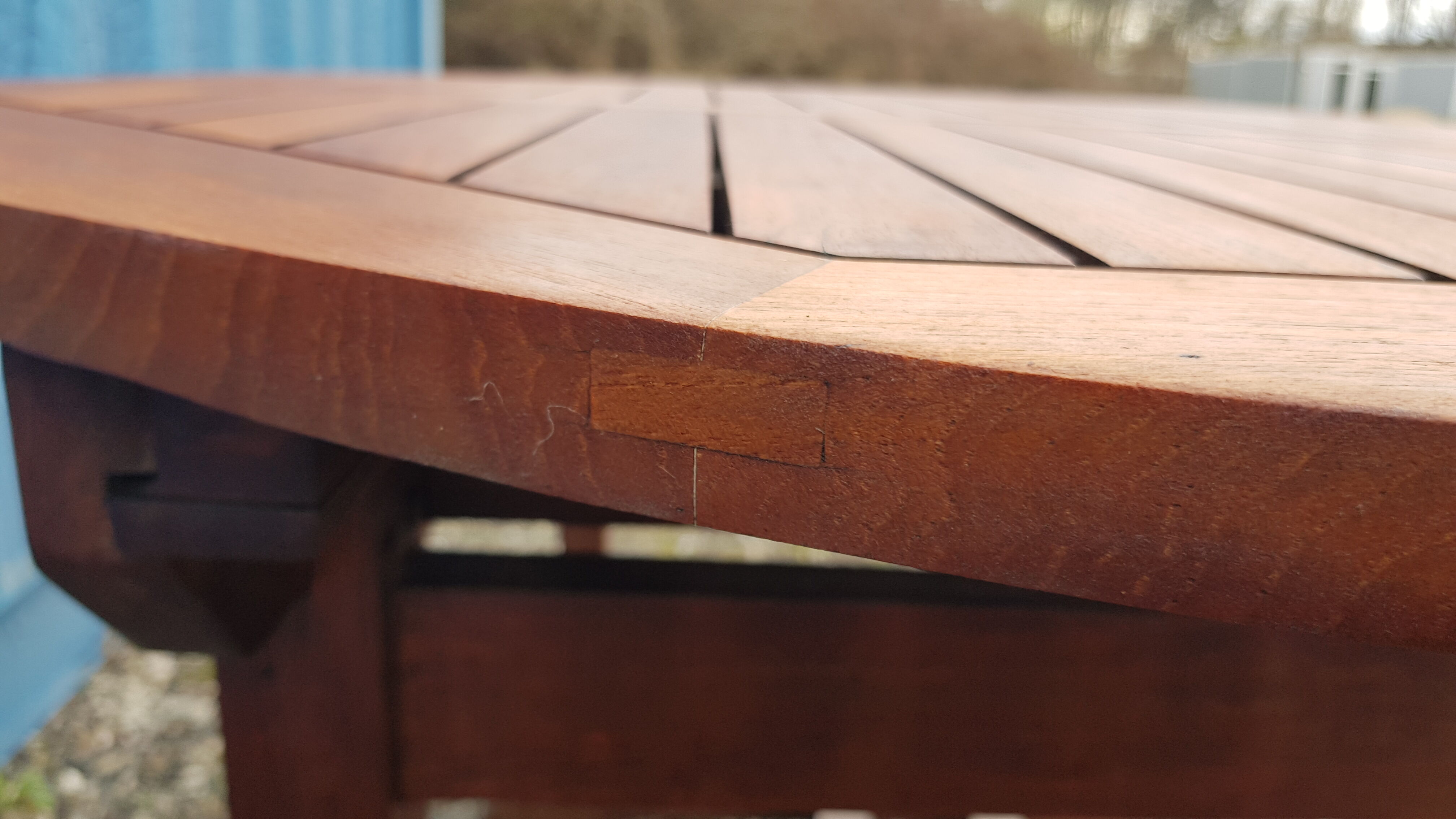 Stretchable garden dining table in solid teak