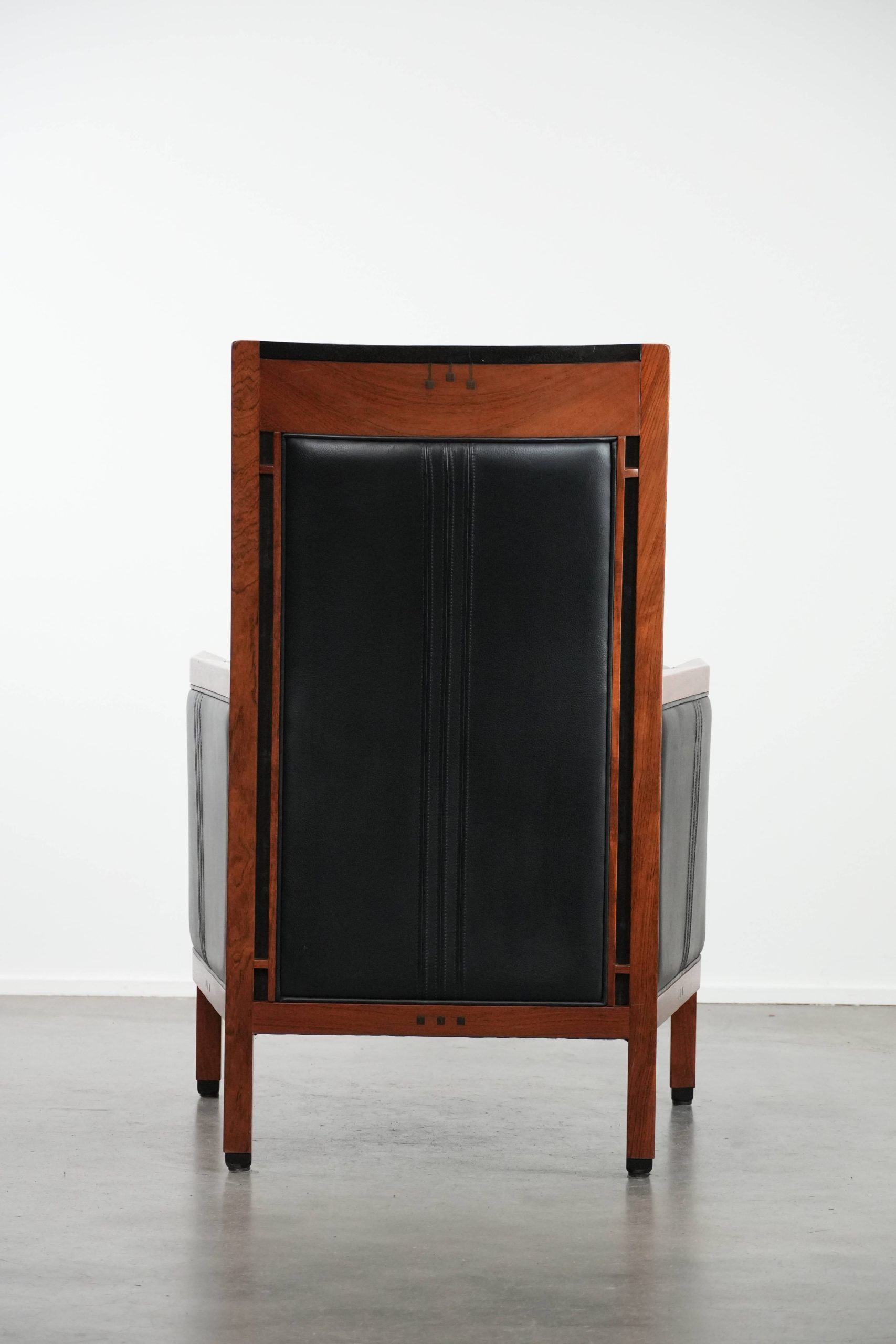 Beautiful and very comfortable black Art Deco design armchair