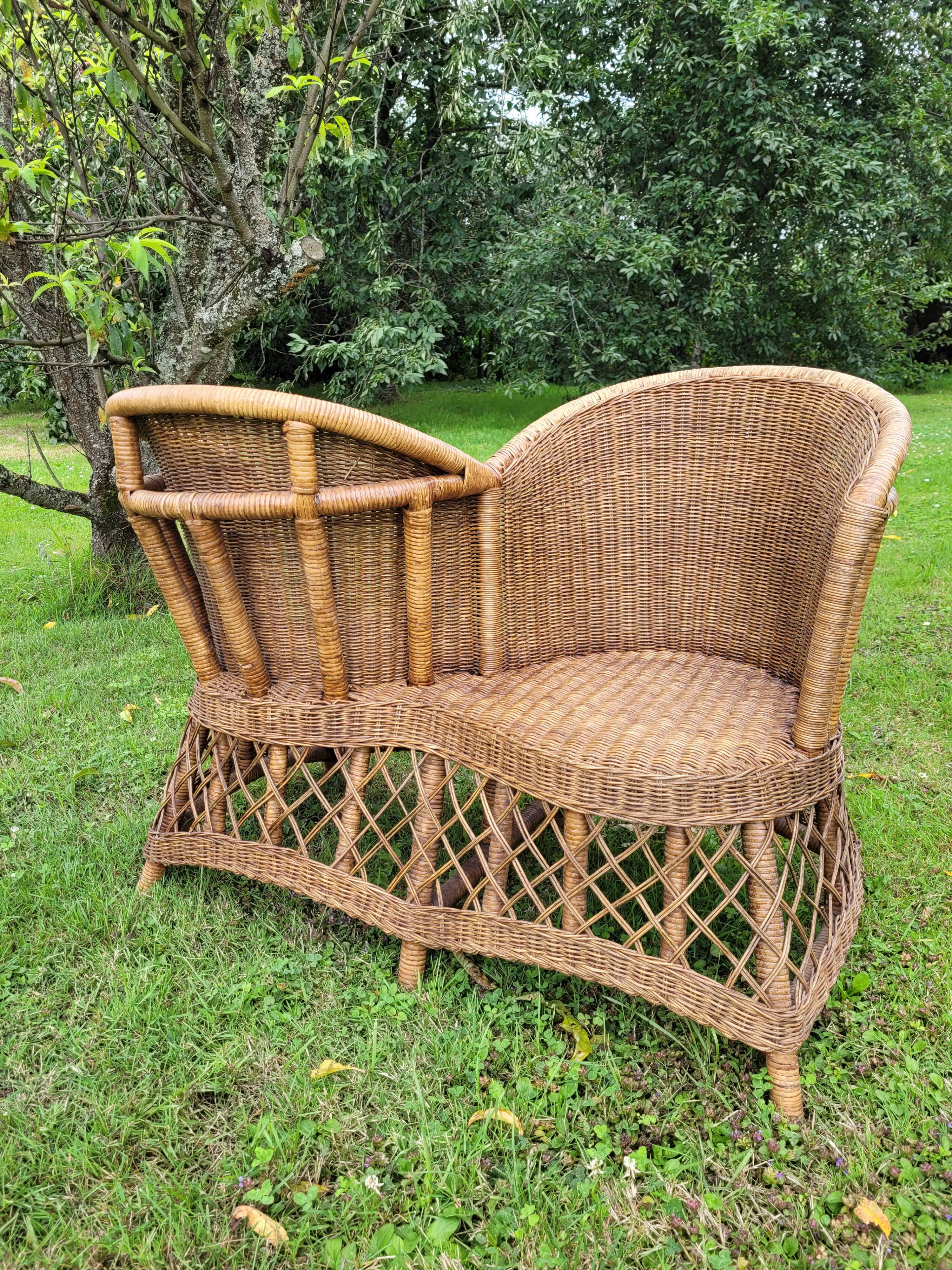 Vintage rattan confidant sofa