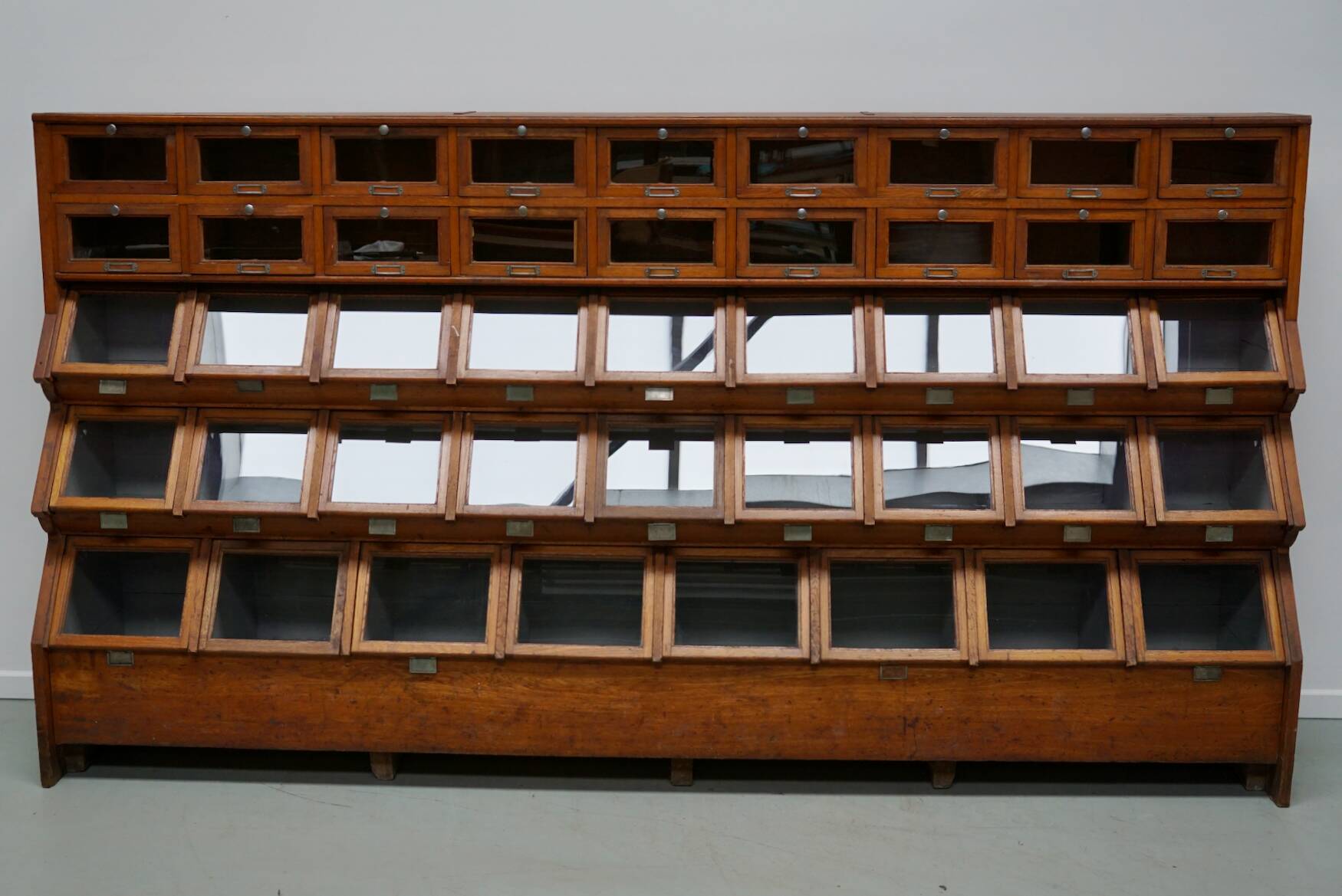 Very large Dutch oak showcase for grocery or haberdashery, 1920s-1930s