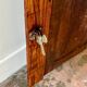 2-door, 3-shelf wall cupboard in dark wood