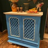 Large colonial style wooden cabinet with latticework