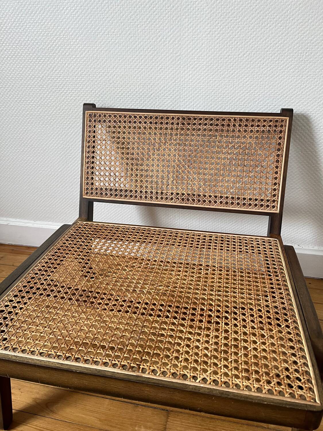 Vintage wooden and cane armchair