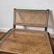 Vintage wooden and cane armchair