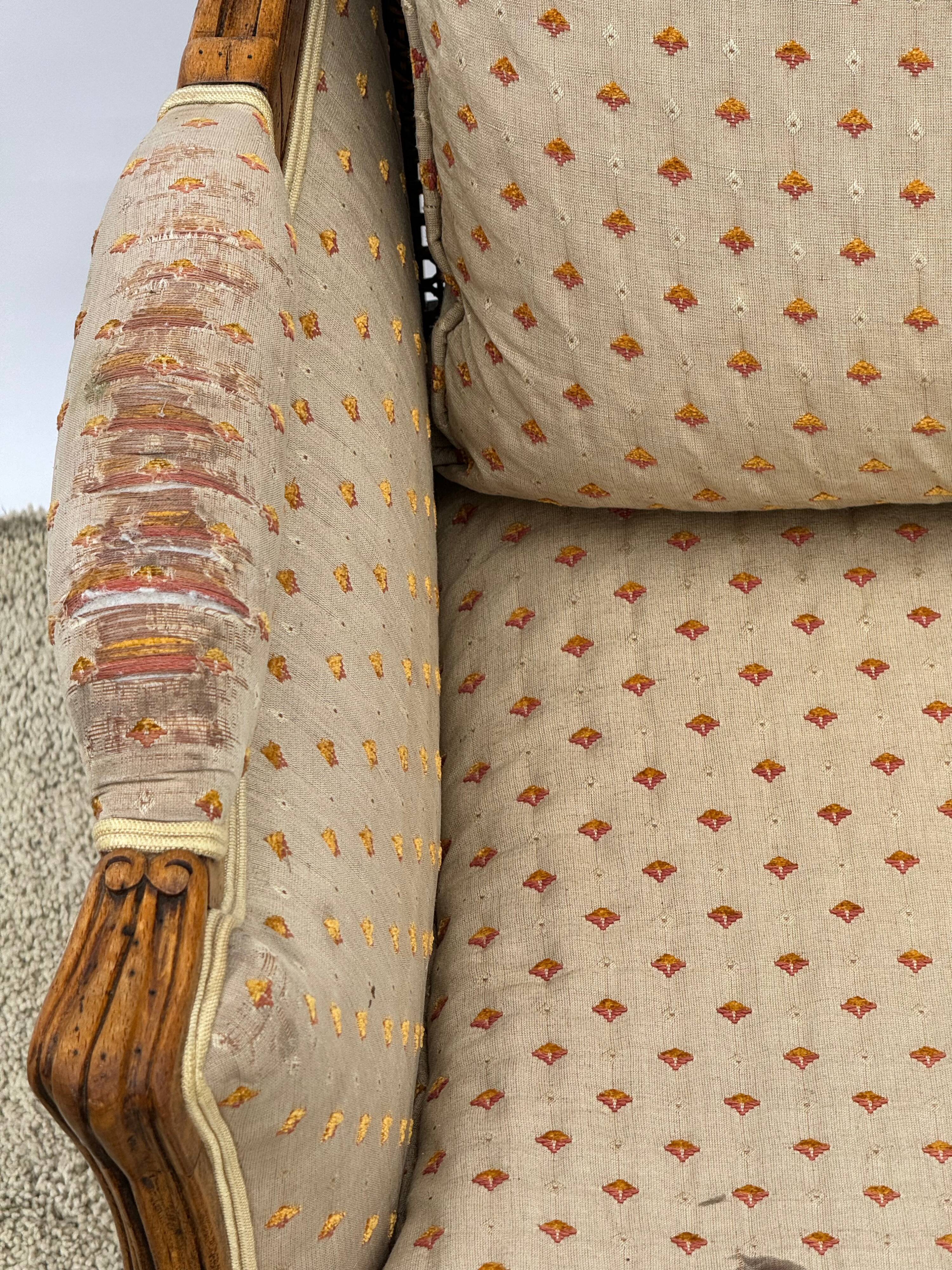Fauteuil bergère à dossier canné