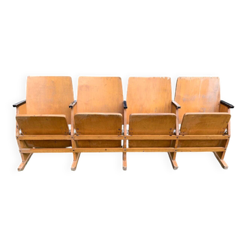 Vintage cinema bench for four people, brown varnished beech in Mid-Century style from the 1950s.