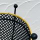 Vintage black perforated metal and brass umbrella stand